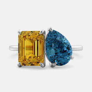 Toi et Moi ring with an emerald-cut Citrine and a pear-cut London Blue Topaz.
