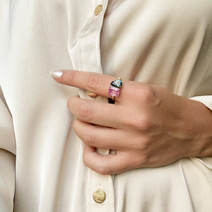 Toi et Moi ring with an emerald-cut Pink Sapphire and a pear-cut London Blue Topaz.