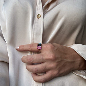 Toi et Moi ring with an emerald-cut Blue Sapphire and a pear-cut Pink Sapphire.