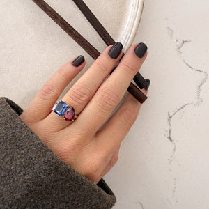 Toi et Moi ring with an emerald-cut Blue Sapphire and a pear-cut Ruby.