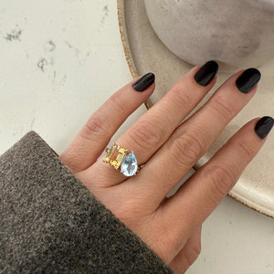 Toi et Moi ring with an emerald-cut Citrine and a pear-cut Aquamarine.