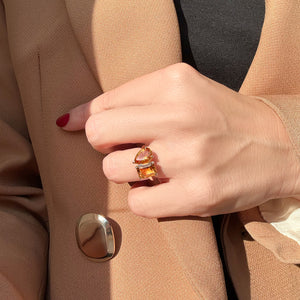 Toi et Moi ring with an emerald-cut Citrine and a pear-cut Citrine.