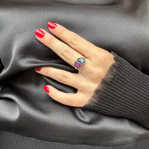 Toi et Moi ring with an emerald-cut Amethyst and a pear-cut London Blue Topaz.