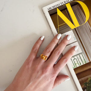Toi et Moi ring with an emerald-cut Citrine and a pear-cut Citrine.