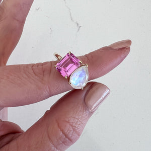 Toi et Moi ring with an emerald-cut Pink Sapphire and a pear-cut Moonstone.
