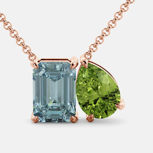 Toi et Moi necklace with an emerald-cut Aquamarine and a pear-cut gemstone.