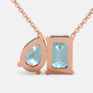 Toi et Moi necklace with an emerald-cut Aquamarine and a pear-cut gemstone.