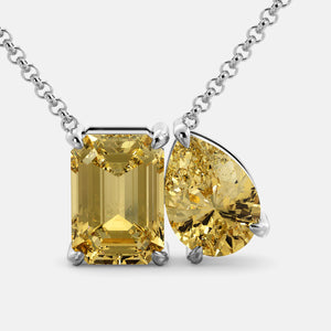 Toi et Moi necklace with an emerald-cut Citrine and a pear-cut gemstone.