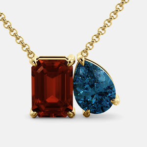 Toi et Moi necklace with an emerald-cut Garnet and a pear-cut gemstone.