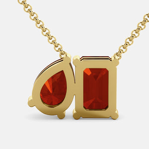 Toi et Moi necklace with an emerald-cut Garnet and a pear-cut gemstone.
