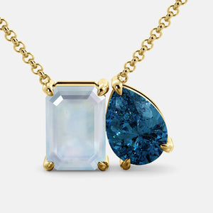 Toi et Moi necklace with an emerald-cut Moonstone and a pear-cut gemstone.