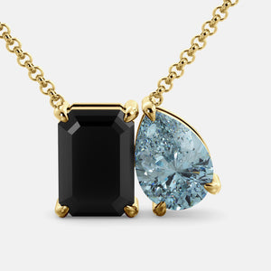 Toi et Moi necklace with an emerald-cut Onyx and a pear-cut gemstone.