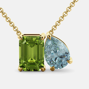 Toi et Moi necklace with an emerald-cut Green Peridot and a pear-cut gemstone.