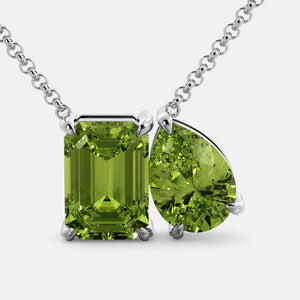 Toi et Moi necklace with an emerald-cut Green Peridot and a pear-cut gemstone.