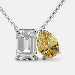Toi et Moi necklace with an emerald-cut Diamond and a pear-cut White Topaz.
