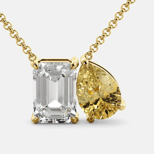 Toi et Moi necklace with an emerald-cut Diamond and a pear-cut White Topaz.