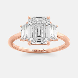 Embrace Opulence: The Julia Emerald Solitaire Diamond Ring with Tapered Baguettes