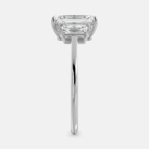 Embrace Opulence: The Julia Emerald Solitaire Diamond Ring with Tapered Baguettes