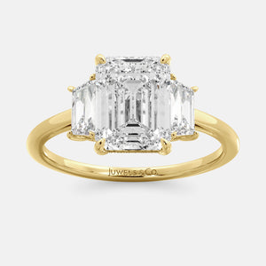 Embrace Opulence: The Julia Emerald Solitaire Diamond Ring with Tapered Baguettes