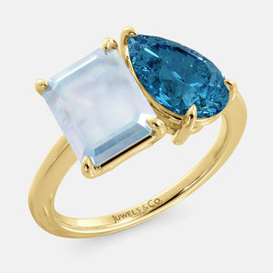 Toi et Moi ring with an emerald-cut Moonstone and a pear-cut London Blue Topaz.