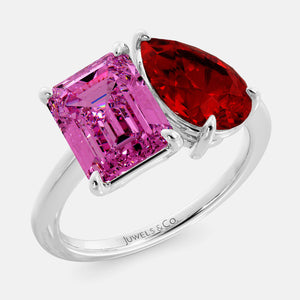 Toi et Moi ring with an emerald-cut Pink Sapphire and a pear-cut Ruby.