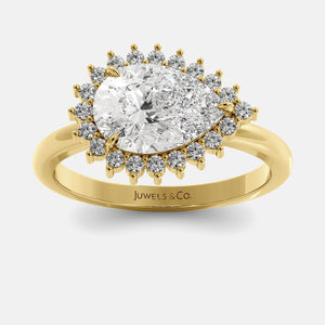 Gold ring with a large diamond and smaller diamonds on a white background, featuring the brand 'Juwels & Co'.