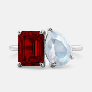 Toi et Moi ring with an emerald-cut Ruby and a pear-cut Moonstone.