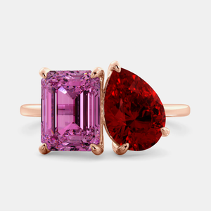 Toi et Moi ring with an emerald-cut Pink Sapphire and a pear-cut Ruby.