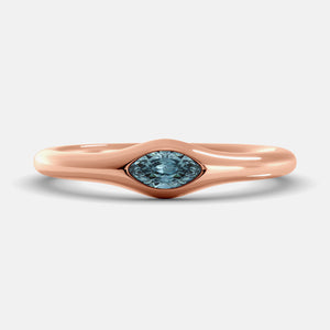 The Crest Wave Ring in 14K rose gold with marquise aquamarine