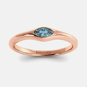 The Crest Wave Ring in 14K rose gold with marquise aquamarine