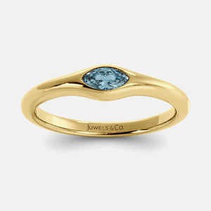 The Crest Wave Ring in 14K yellow gold with marquise aquamarine