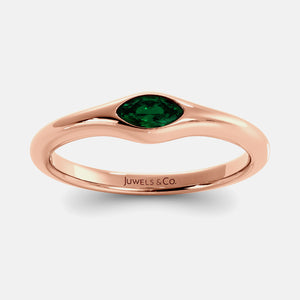 The Crest Wave Ring in 14K rose gold with marquise emerald