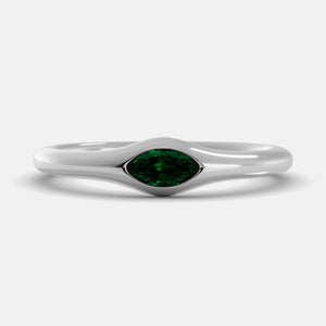 The Crest Wave Ring in 14K white gold with marquise emerald