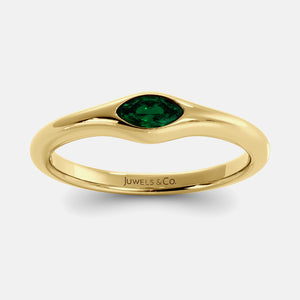 The Crest Wave Ring in 14K yellow gold with marquise emerald
