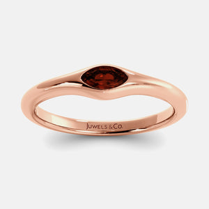 The Crest Wave Ring in 14K rose gold with marquise garnet