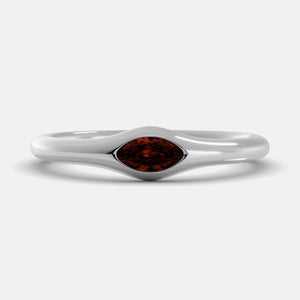 The Crest Wave Ring in 14K white gold with marquise garnet