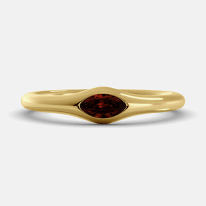 The Crest Wave Ring in 14K yellow gold with marquise garnet