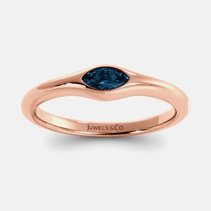 The Crest Wave Ring in 14K rose gold with marquise London blue topaz