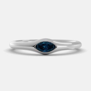 The Crest Wave Ring in 14K white gold with marquise London blue topaz