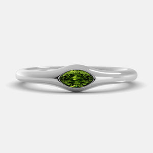 The Crest Wave Ring in 14K white gold with marquise peridot