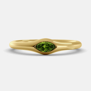 The Crest Wave Ring in 14K yellow gold with marquise peridot