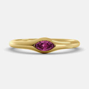 The Crest Wave Ring in 14K yellow gold with marquise pink sapphire