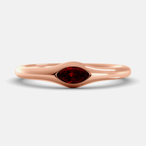The Crest Wave Ring in 14K rose gold with marquise ruby