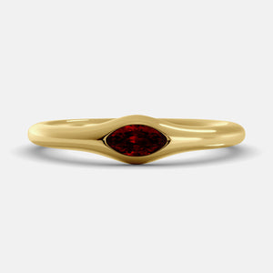 The Crest Wave Ring in 14K yellow gold with marquise ruby