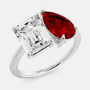 Toi et Moi ring with an emerald-cut Diamond and a pear-cut Ruby.