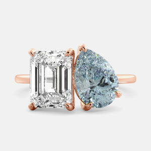 Toi et Moi ring with an emerald-cut Diamond and a pear-cut Aquamarine.