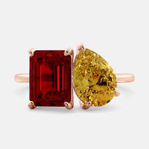 Toi et Moi ring with an emerald-cut Ruby and a pear-cut Citrine.