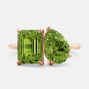 Toi et Moi ring with an emerald-cut Green Peridot and a pear-cut Green Peridot.