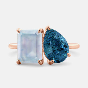 Toi et Moi ring with an emerald-cut Moonstone and a pear-cut London Blue Topaz.
