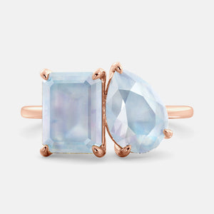 Toi et Moi ring with an emerald-cut Moonstone and a pear-cut Moonstone.